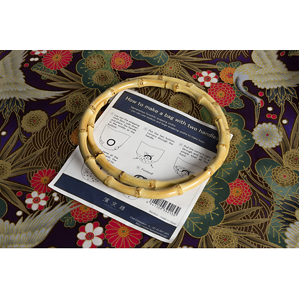 Coupon Tissu/sac gold grues/fleurs 110X110