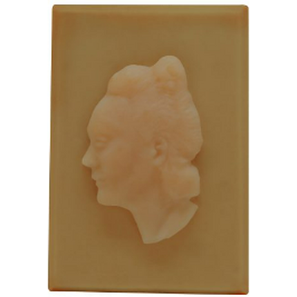 Box composed of an organic cold process soap and a biographical text.